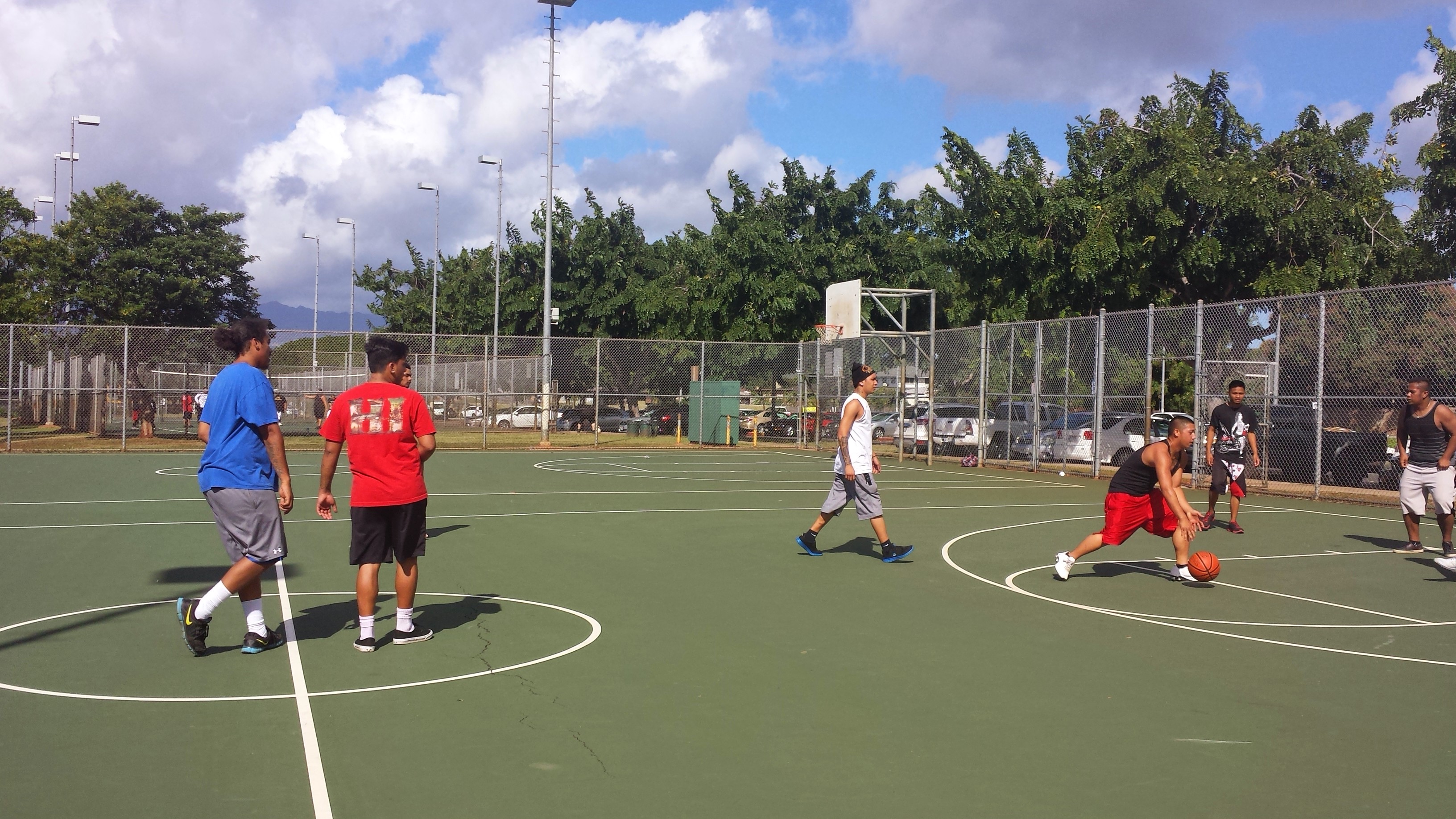 YouthBuild Honolulu | Students playing basketball.